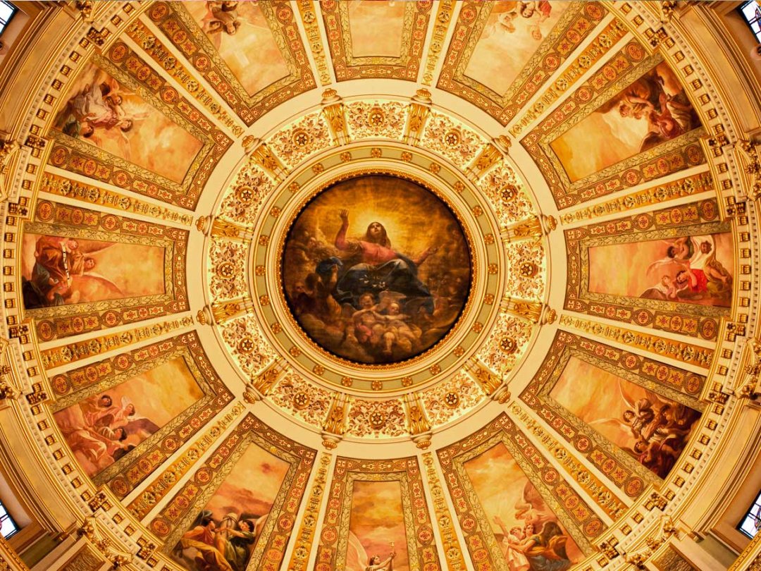 the basilica's highly-decorated rotunda celing