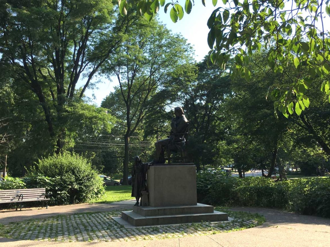 statue of Charles Dickens and Little Nell in Clark Park