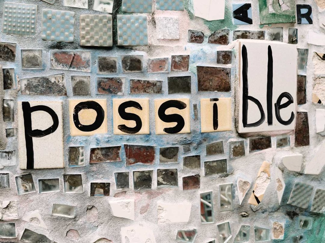 the word 'possible' spelled out in a mosaic
